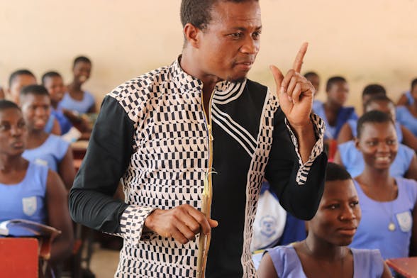 Ghanan teacher coaching students